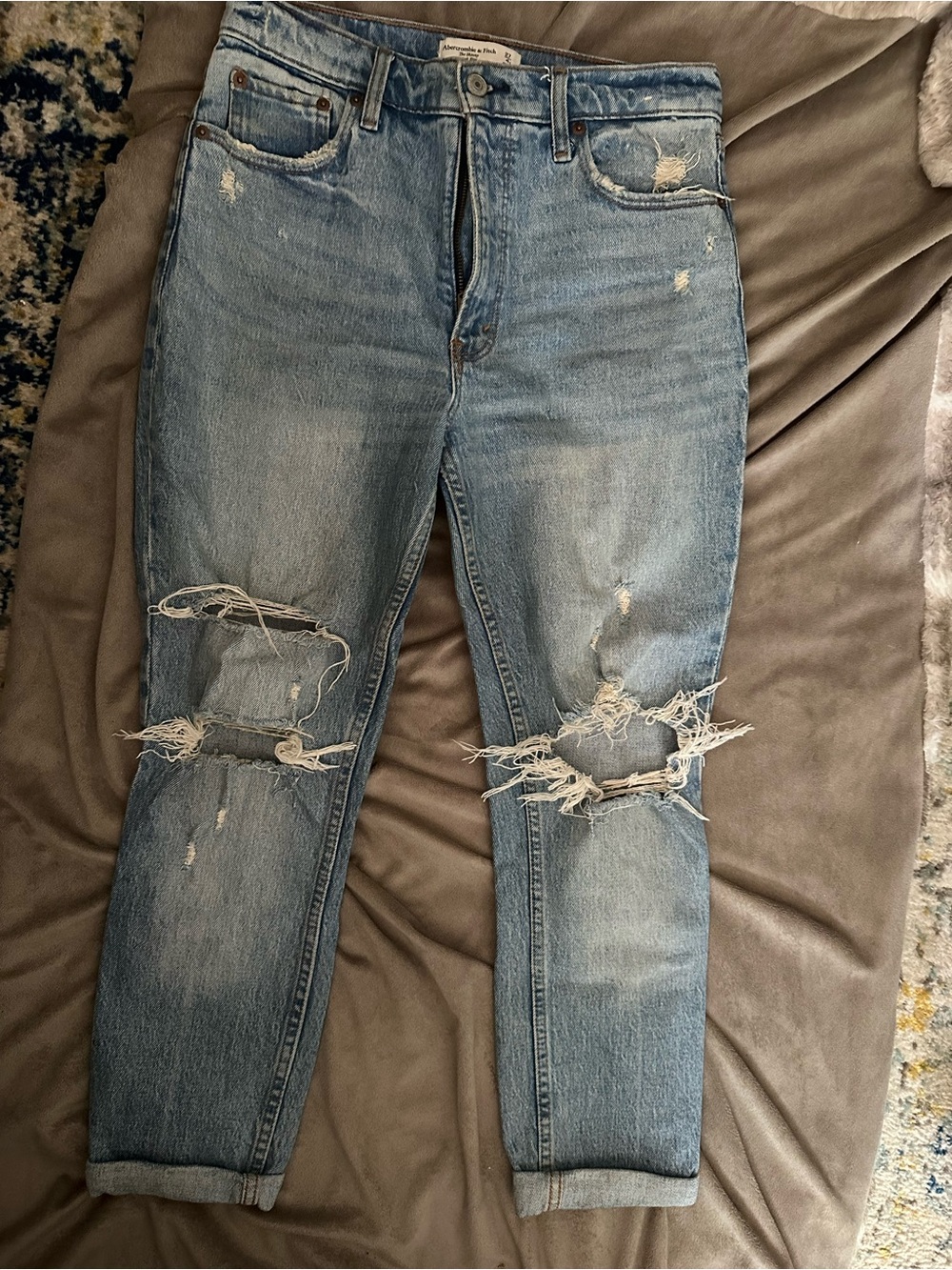 The Skinny High Rise Light Blue Distressed Ripped Jeans
